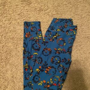 LuLaRoe Blue, Yellow and Red Floral Leggings Design